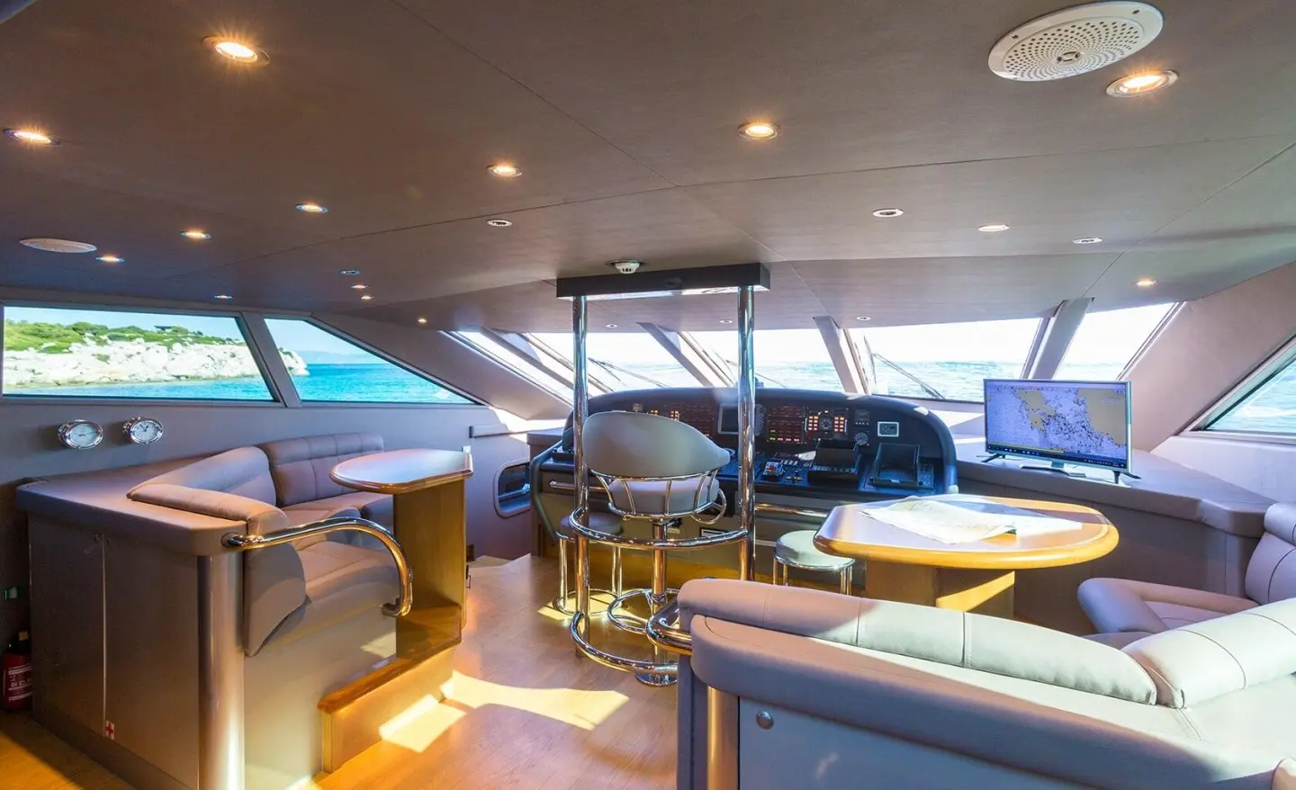 Interior view of luxury yacht Aquarella deck seating area with windows
