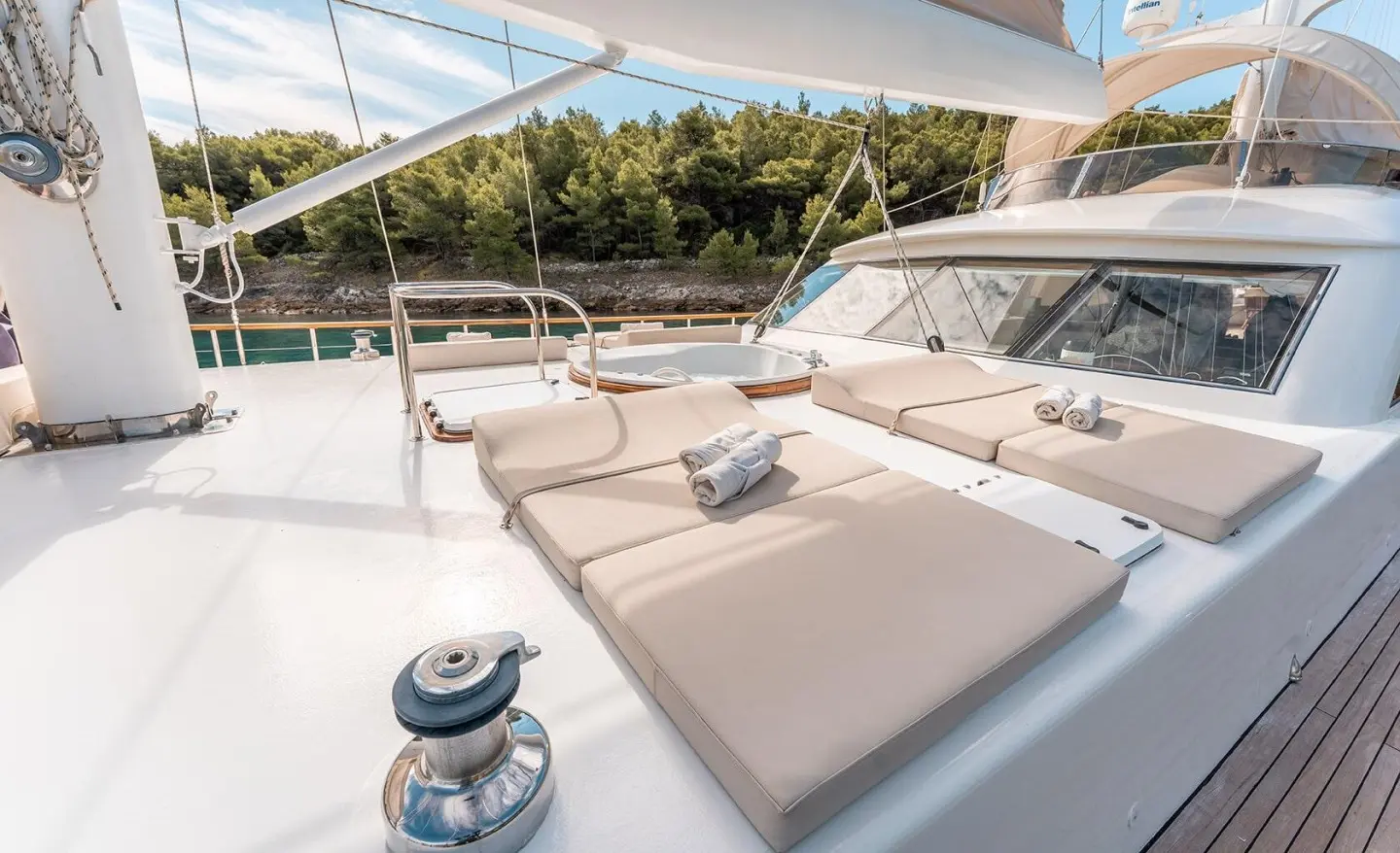 Alessandro I yacht deck at sunset with seating and sunshade on a luxury gulet