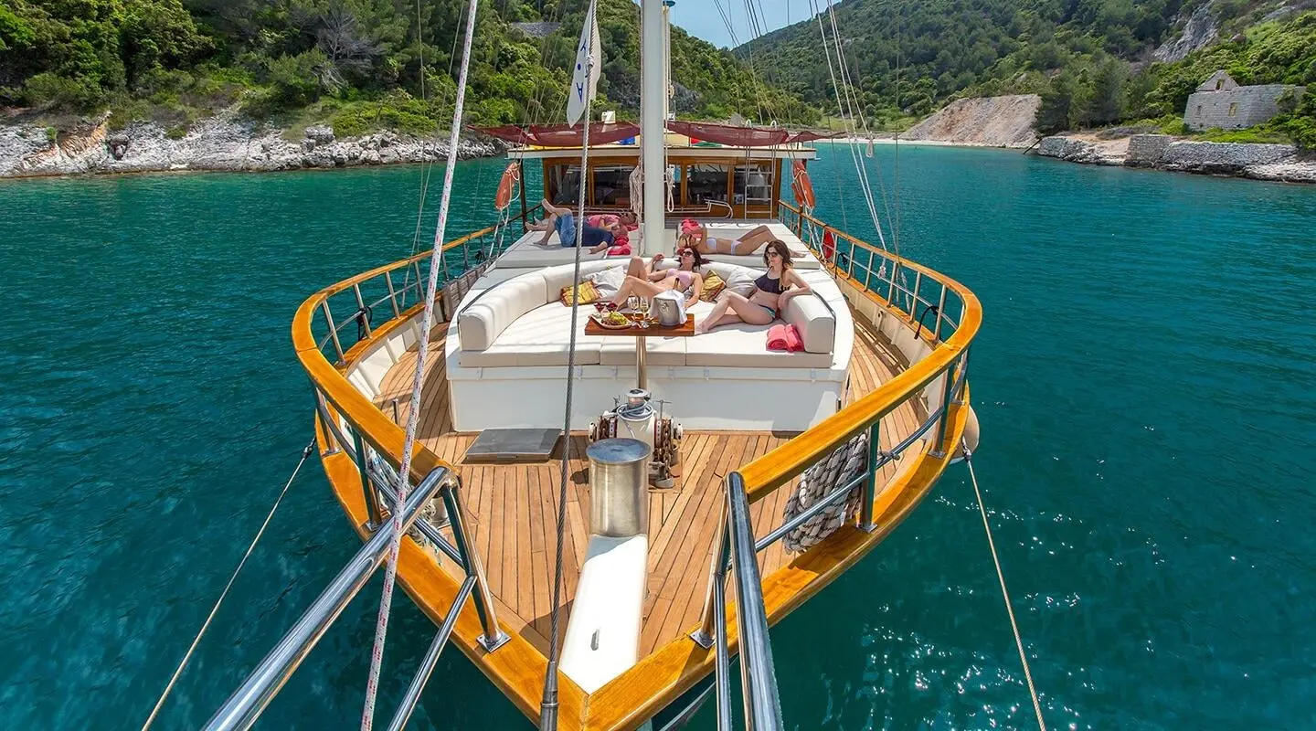 Altair gulet seen from the bowsprit, wooden deck yacht