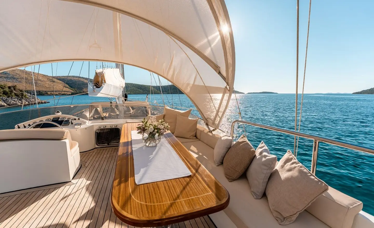 Gulet Alessandro I deck with shaded canopy, seating, and sea view