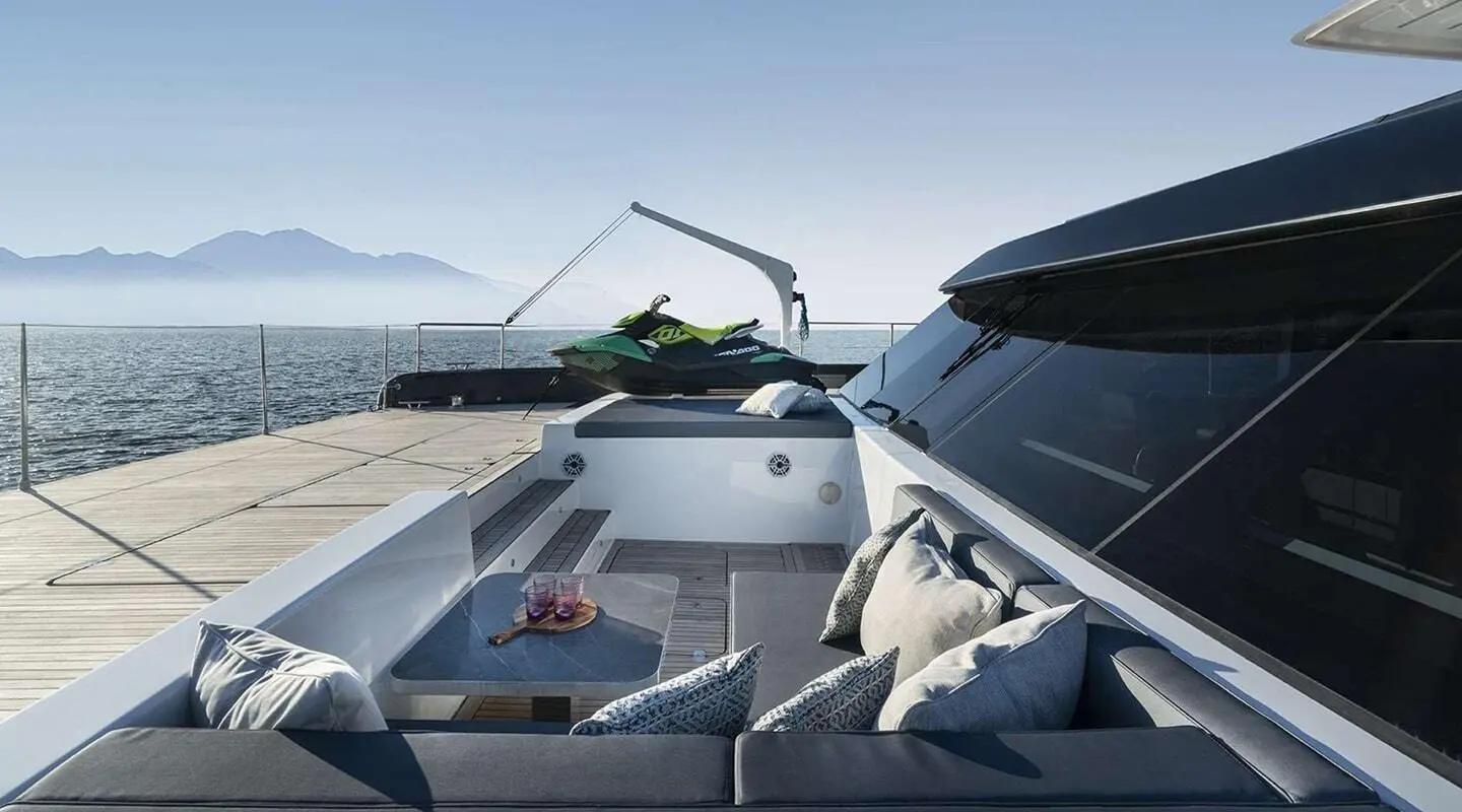 Yacht Alteya deck with seating, ropes, and outdoor cushions on a sunny day