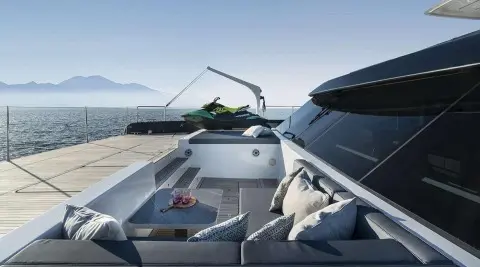 Yacht Alteya deck with seating, ropes, and outdoor cushions on a sunny day