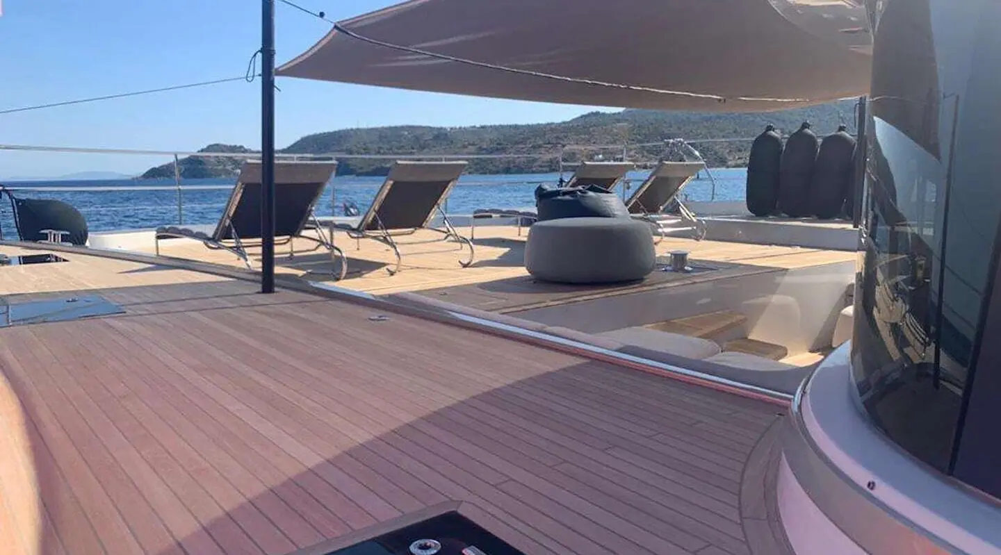 Just Marie 2 outdoor sundeck with loungers and shaded seating on a luxury yacht