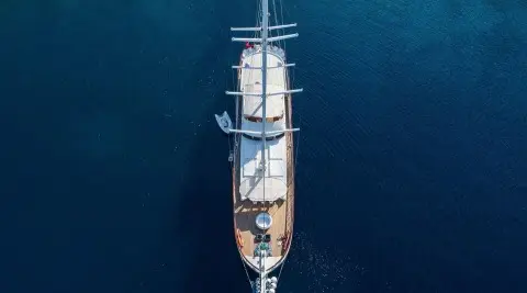 Top-down view of luxury yacht Halcon Del Mar at sea during daylight sails