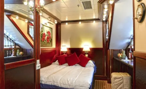 Luxury gulet yacht named Running on Waves under sunset sky with calm sea