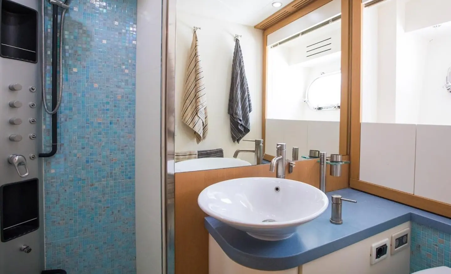 Yacht Salt deck view showing bathroom with sink and towel hooks