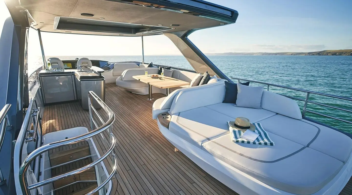 Elizabeth yacht with sun deck and white seating aboard at sunset