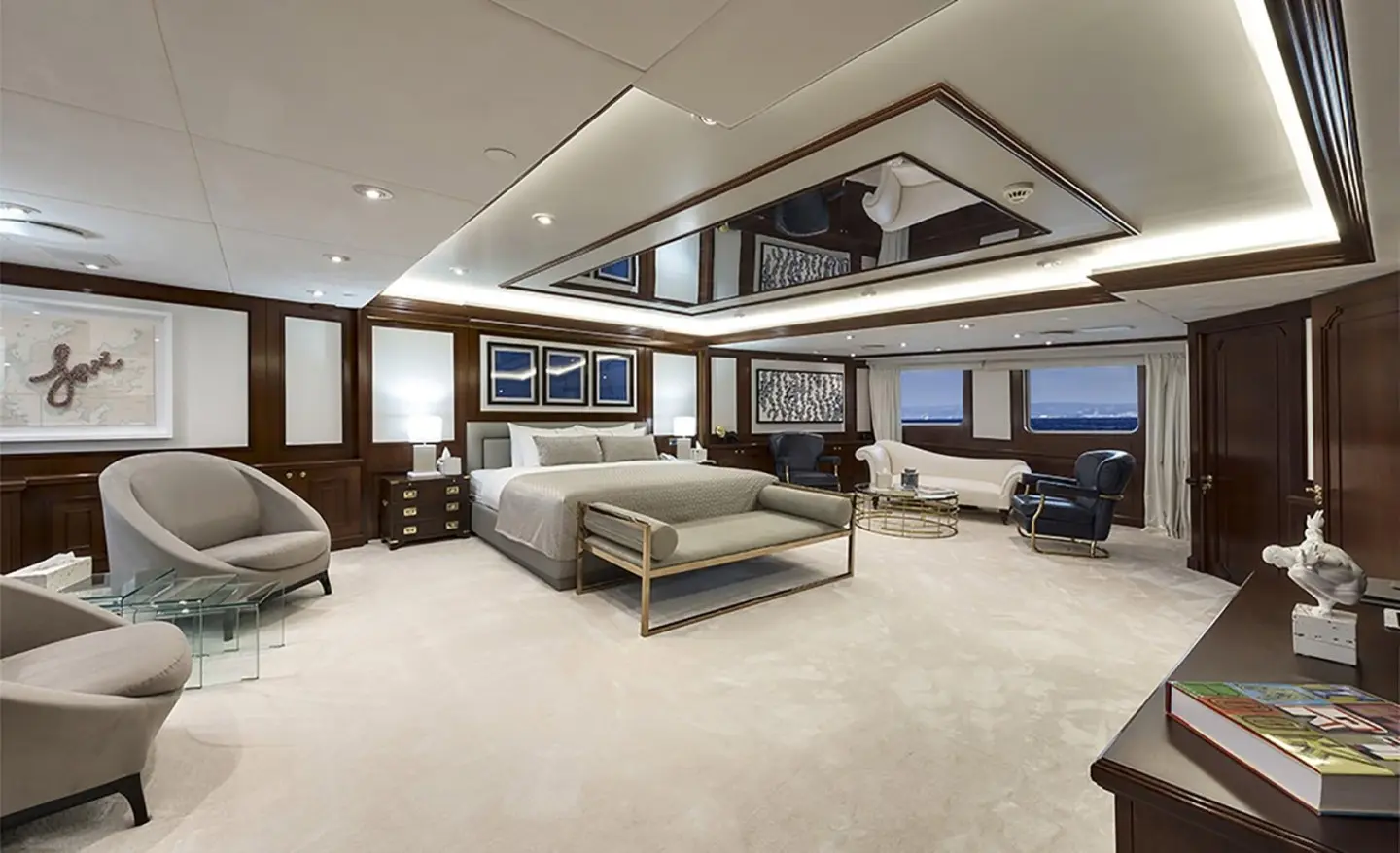 Chakra yacht interior: bright lounge with seating area and coffee table