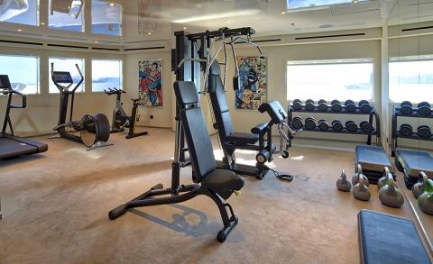 Marquise 72m luxury yacht gym interior with cardio machines and free weights