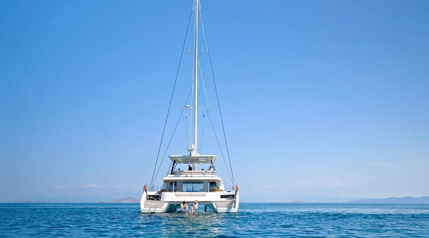 Daiquiri luxury sailing yacht anchored on calm blue sea with clear sky