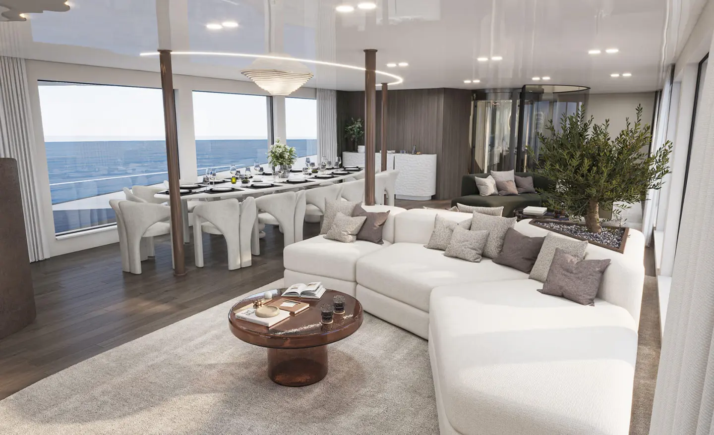 Saloon aboard Bello yacht with white seating, glass doors, and round coffee table