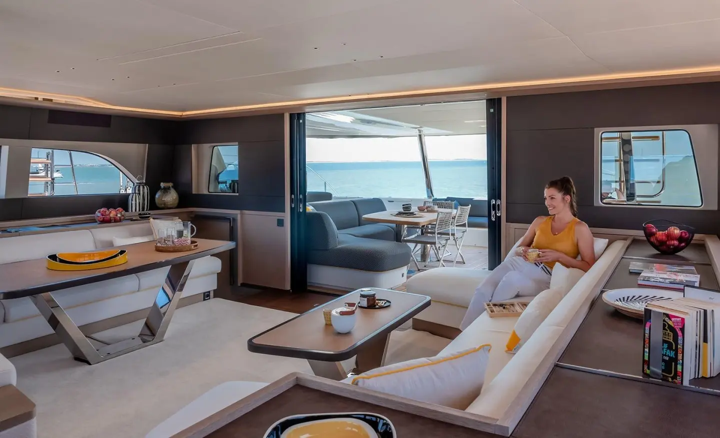 Interior of Daiquiri luxury motor yacht with seating area and open ocean view