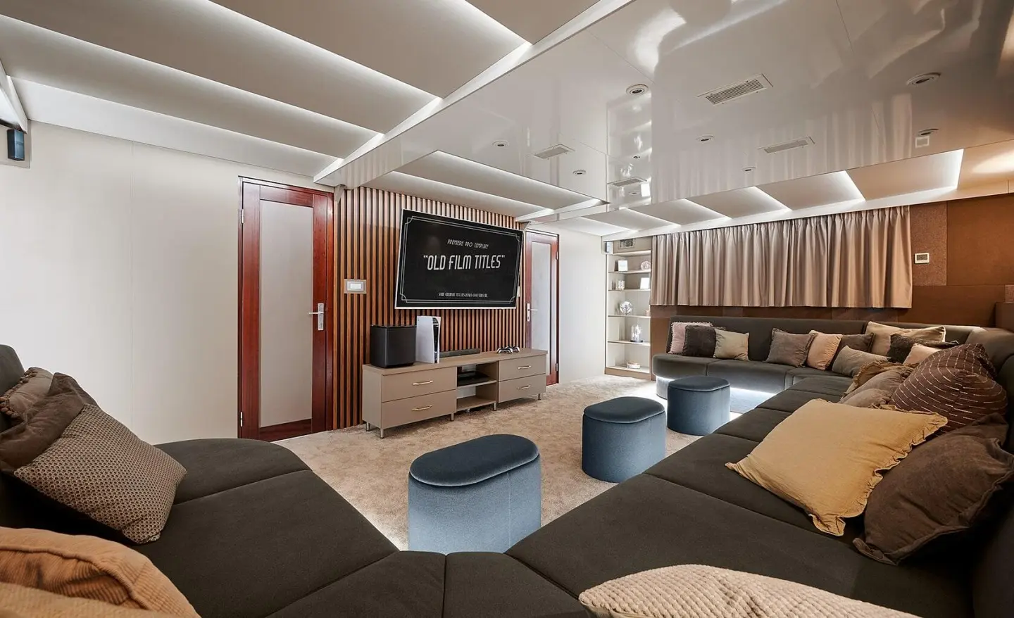 Interior of Lupus Mare yacht lounge with seating, rug, and decorative lights
