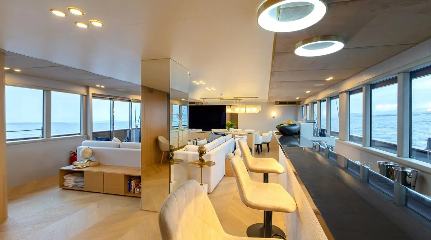 Luxurious yacht interior on Scorpios: sunlit main lounge with panoramic sea views