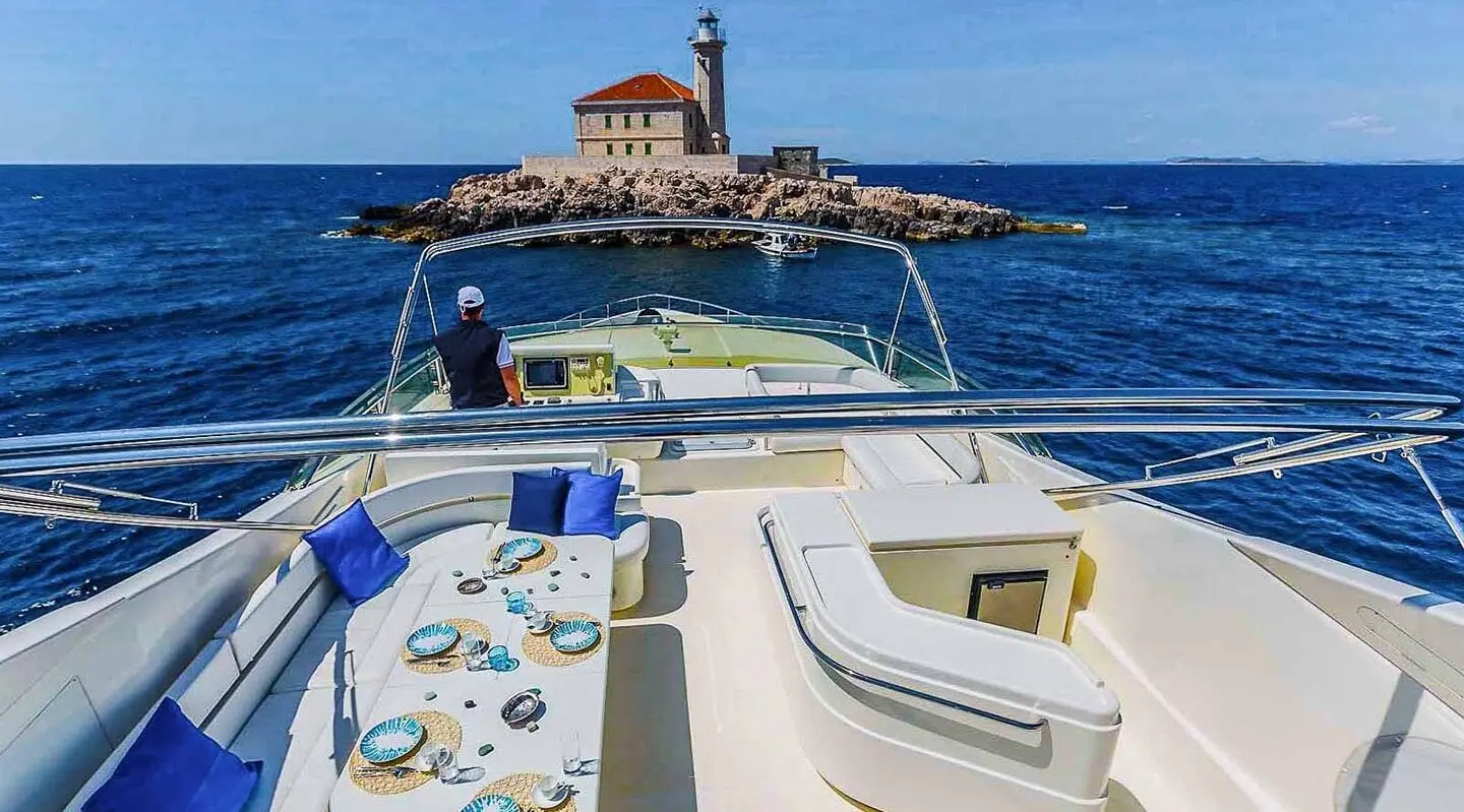 Miss Katariina yacht deck view with seating and sun loungers overlooking blue sea