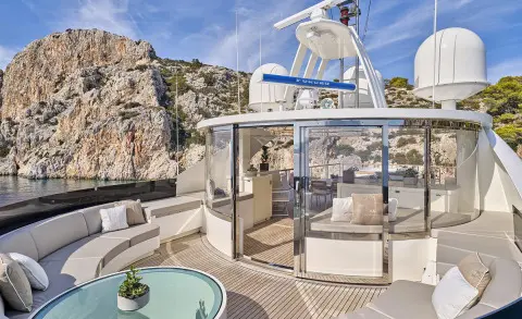 La Pellegrina 1 yacht at sunset with deck seating and glass railing
