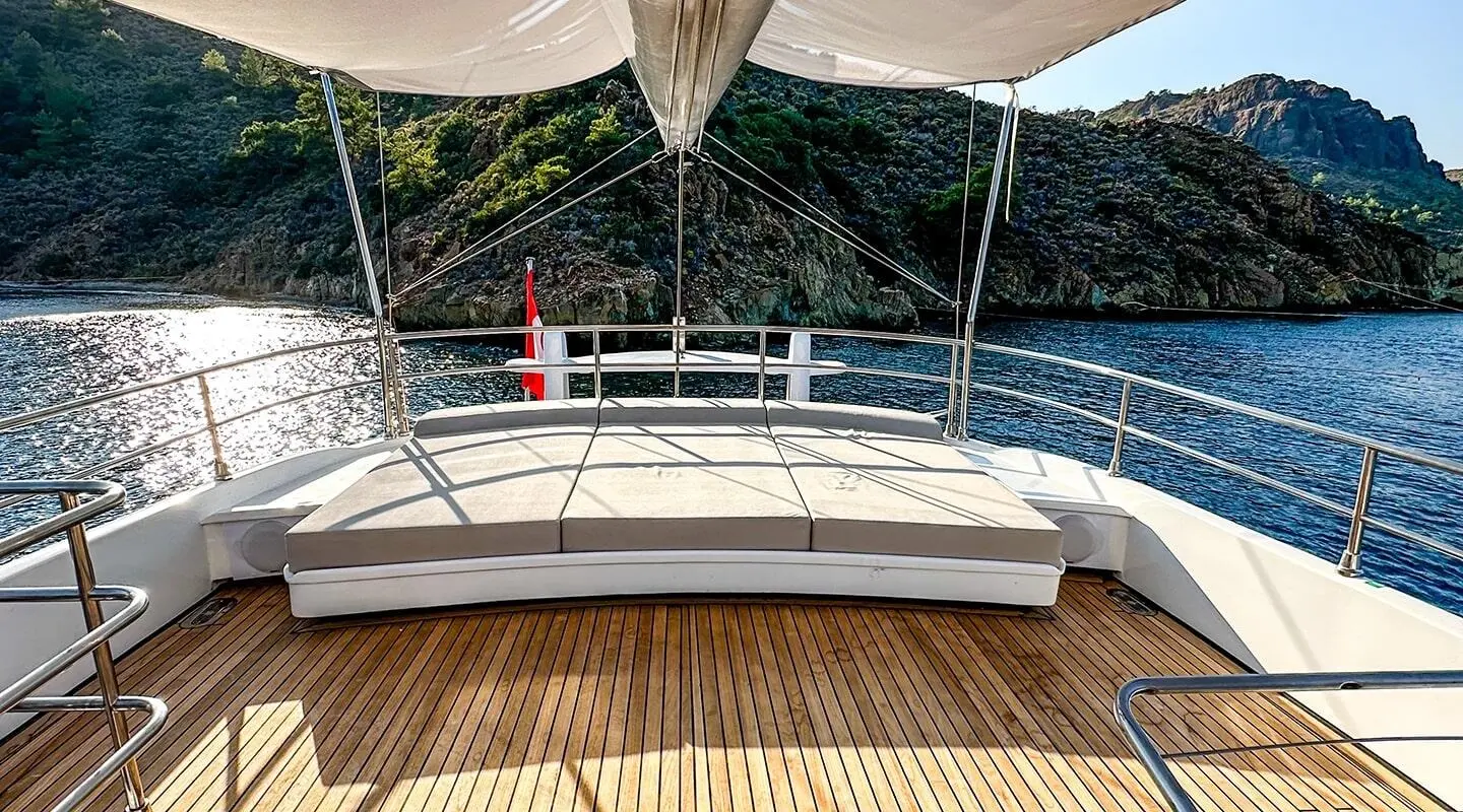 Gulet Angelo III sun deck with wooden deck and metal railing