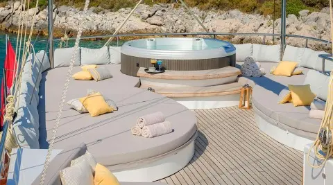 Lady Gita yacht exterior with jacuzzi on deck and sun loungers