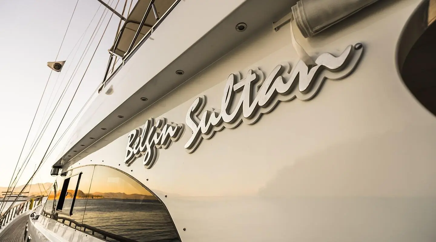 Belgin Sultan yacht gulet on side deck with raised script