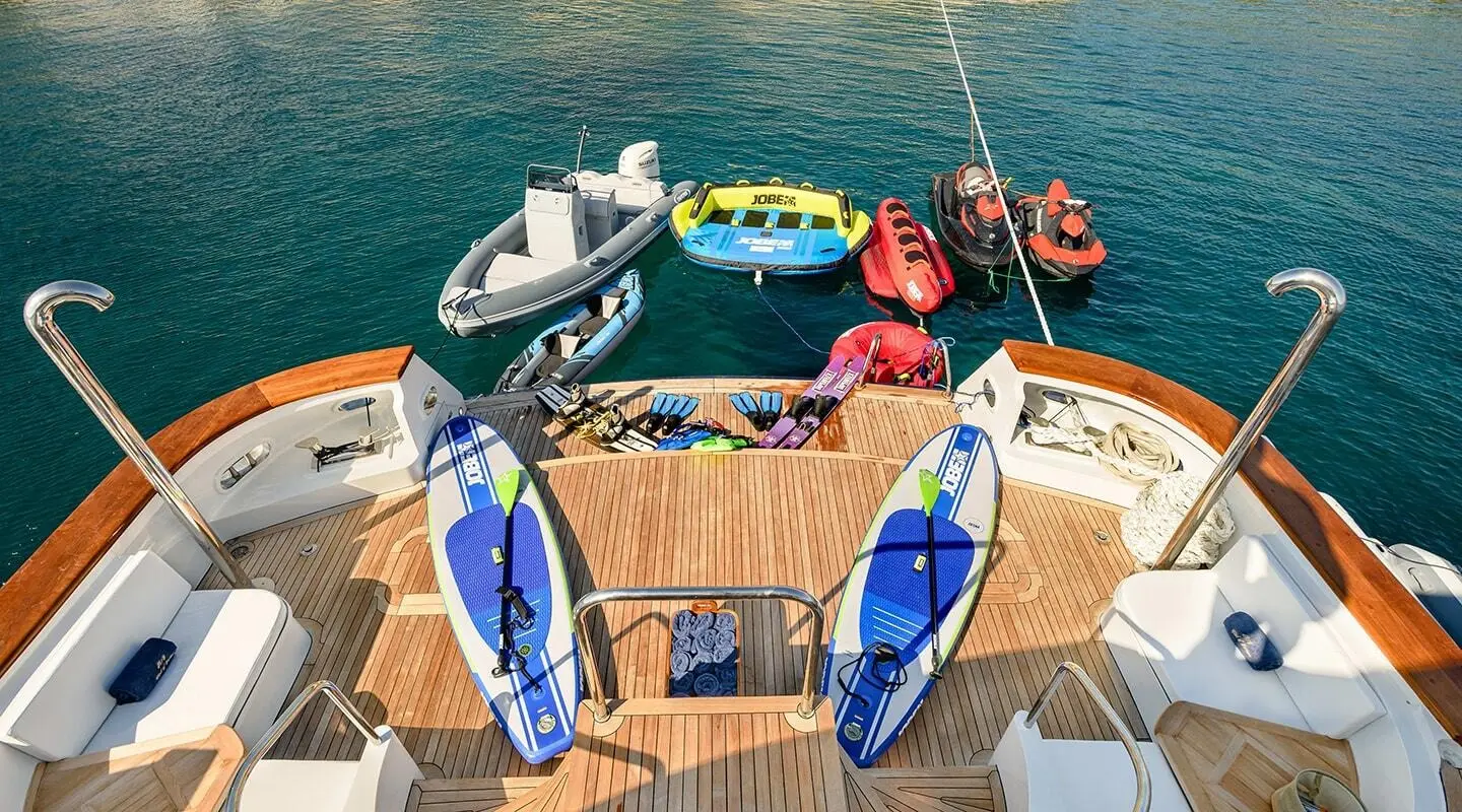 Top-down view of Wind Of Fortune yacht with two blue dinghies on deck