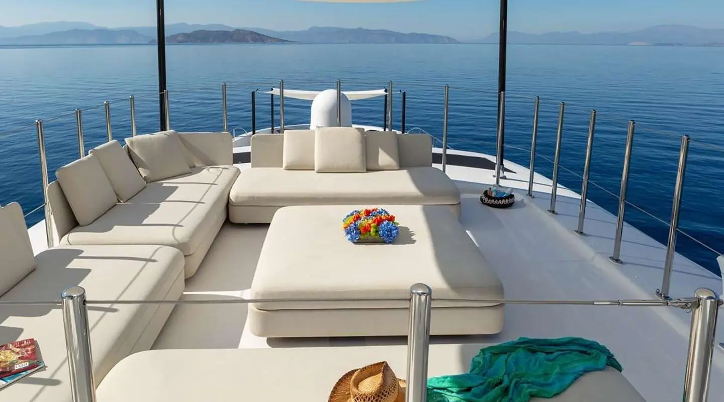 Sea Wolf luxurious sunpad and seating on the bow yacht deck with blue sea backdrop
