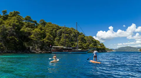 Eleganza gulet with water toys and clear blue sea scenery