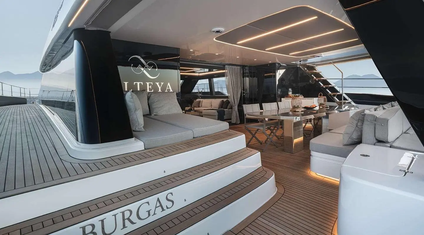 Deck of Alteya luxury yacht with lounge seating and shaded cabin area