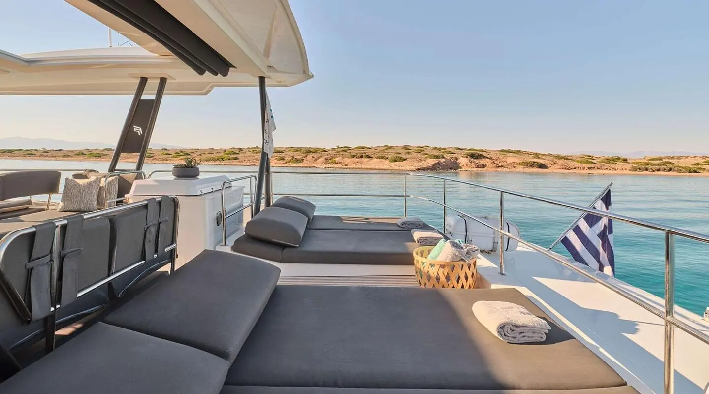 Christal Mio luxury motor yacht deck with sun loungers facing sea