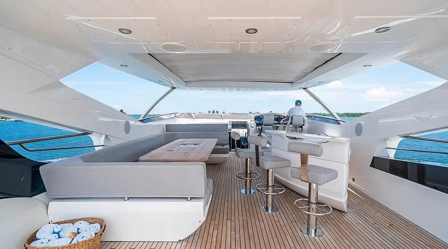 Quantum motor yacht: spacious flybridge with seating, table, and helm
