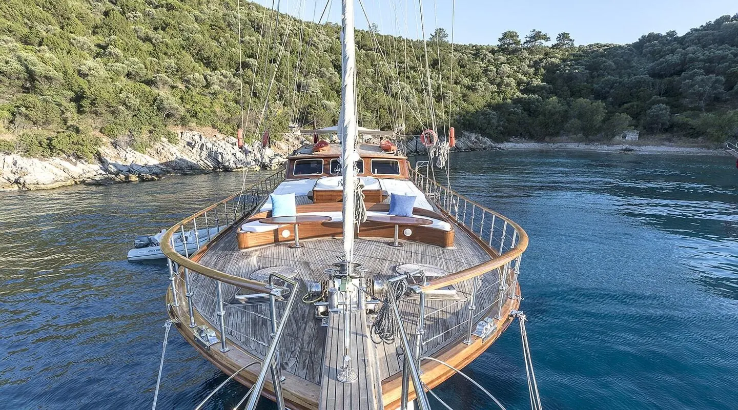 Grace 1 yacht bow view at sunset with rigging and calm blue sea