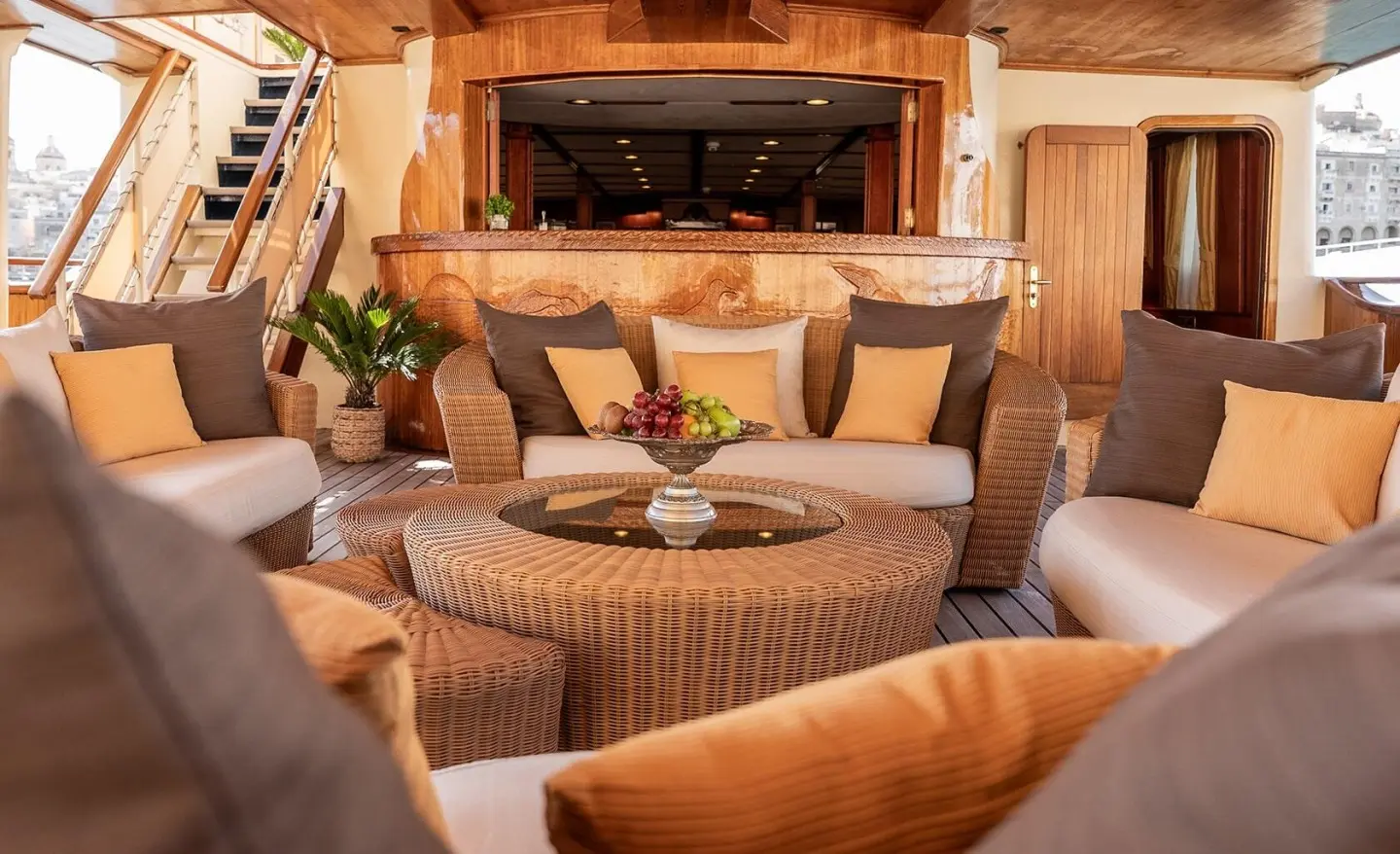 Seagull II yacht deck lounge with cushioned seating and warm ambient lighting