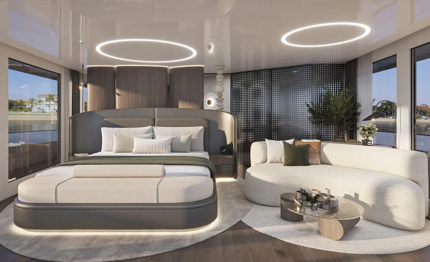 Interior of Bello luxury yacht with modern seating, circular lighting, and a plush cabin
