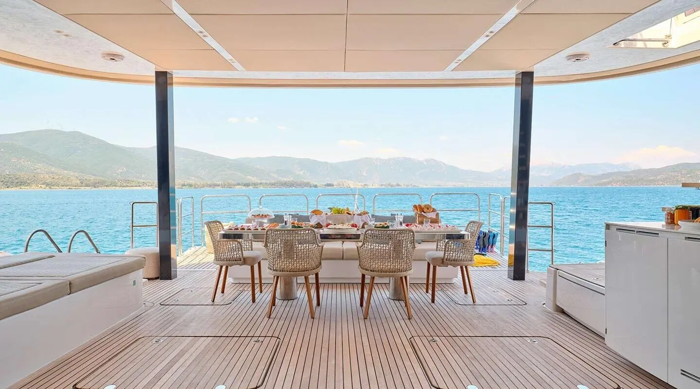 Genny gulet aft deck with seating and table overlooking sea