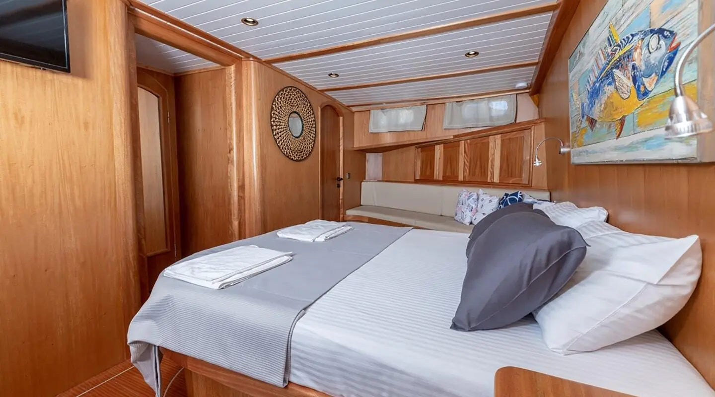 Gulet Bodrum Queen master cabin interior with two beds