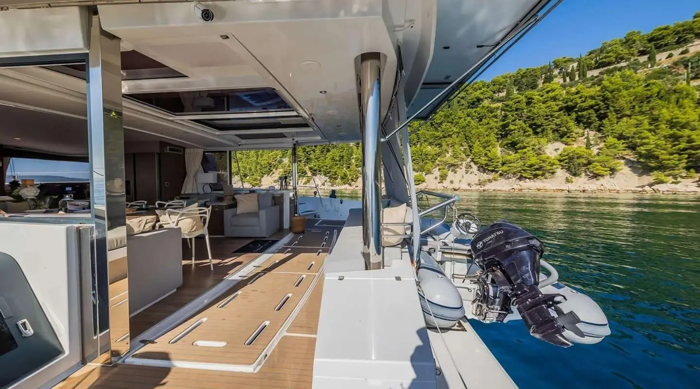 Sitting area and stairs on the aft deck of the Ocean Lounge motor yacht