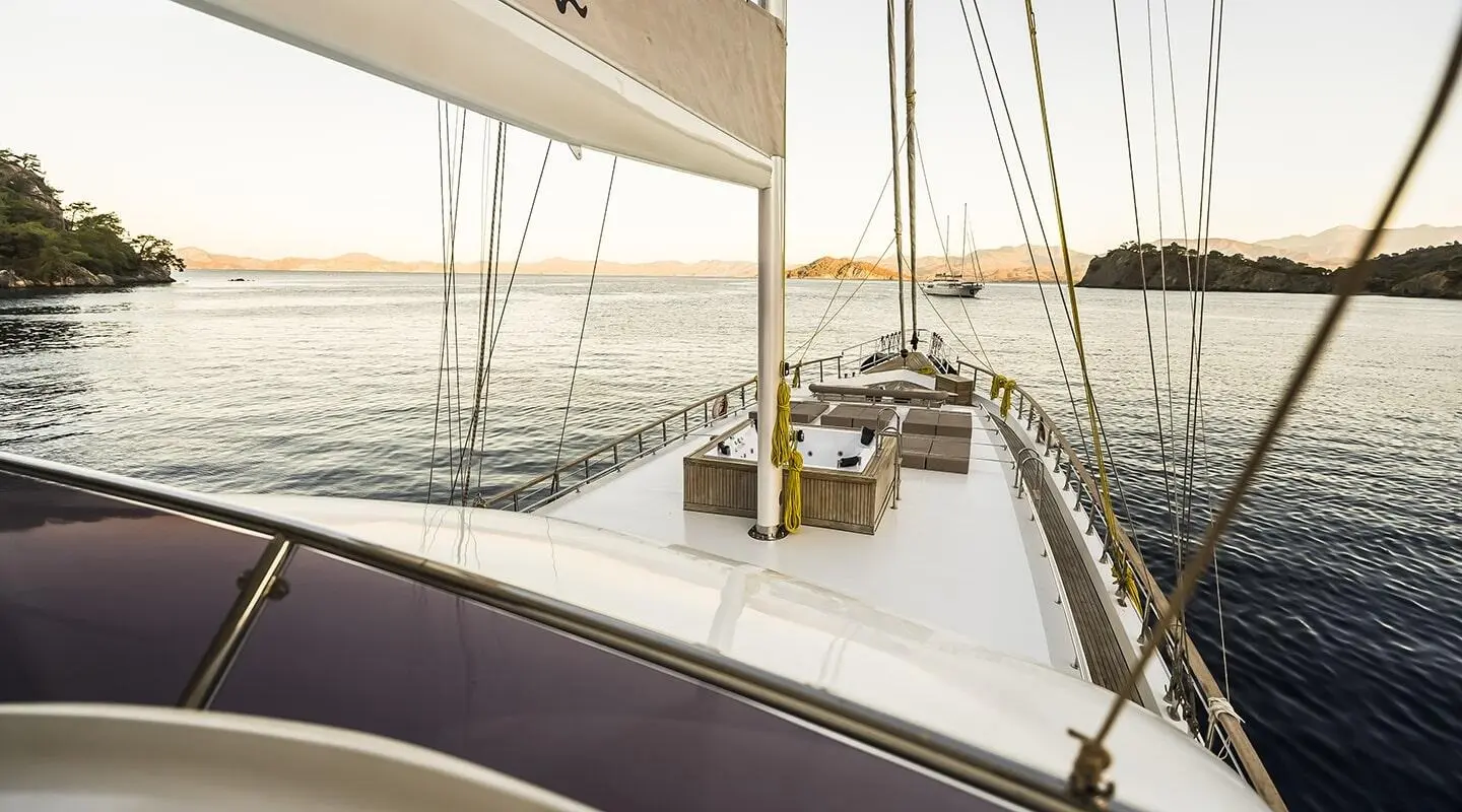 Belgin Sultan gulet deck view with ropes, rail, and calm water