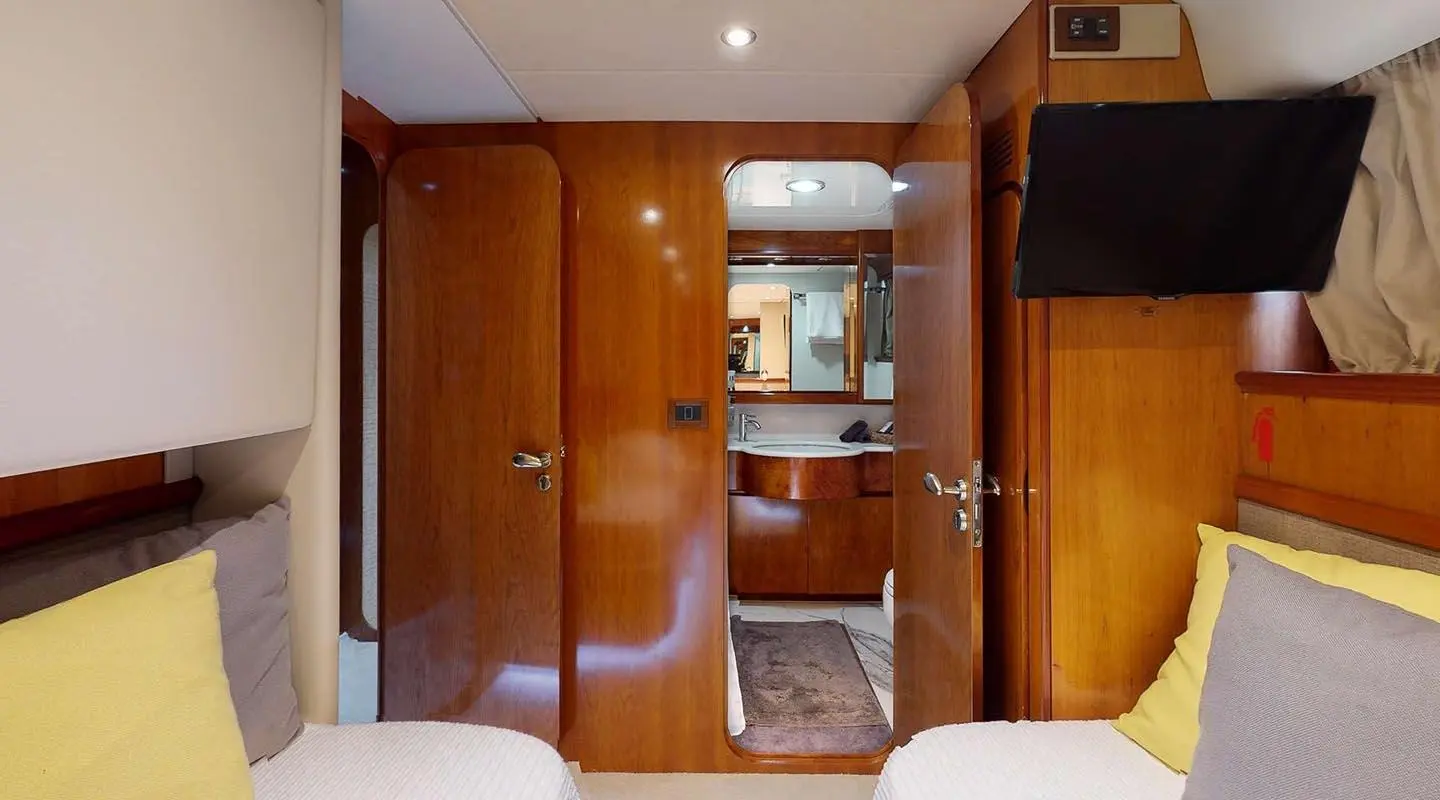 View from cabin toward galley area on Lady Natassa yacht charter with wood panels
