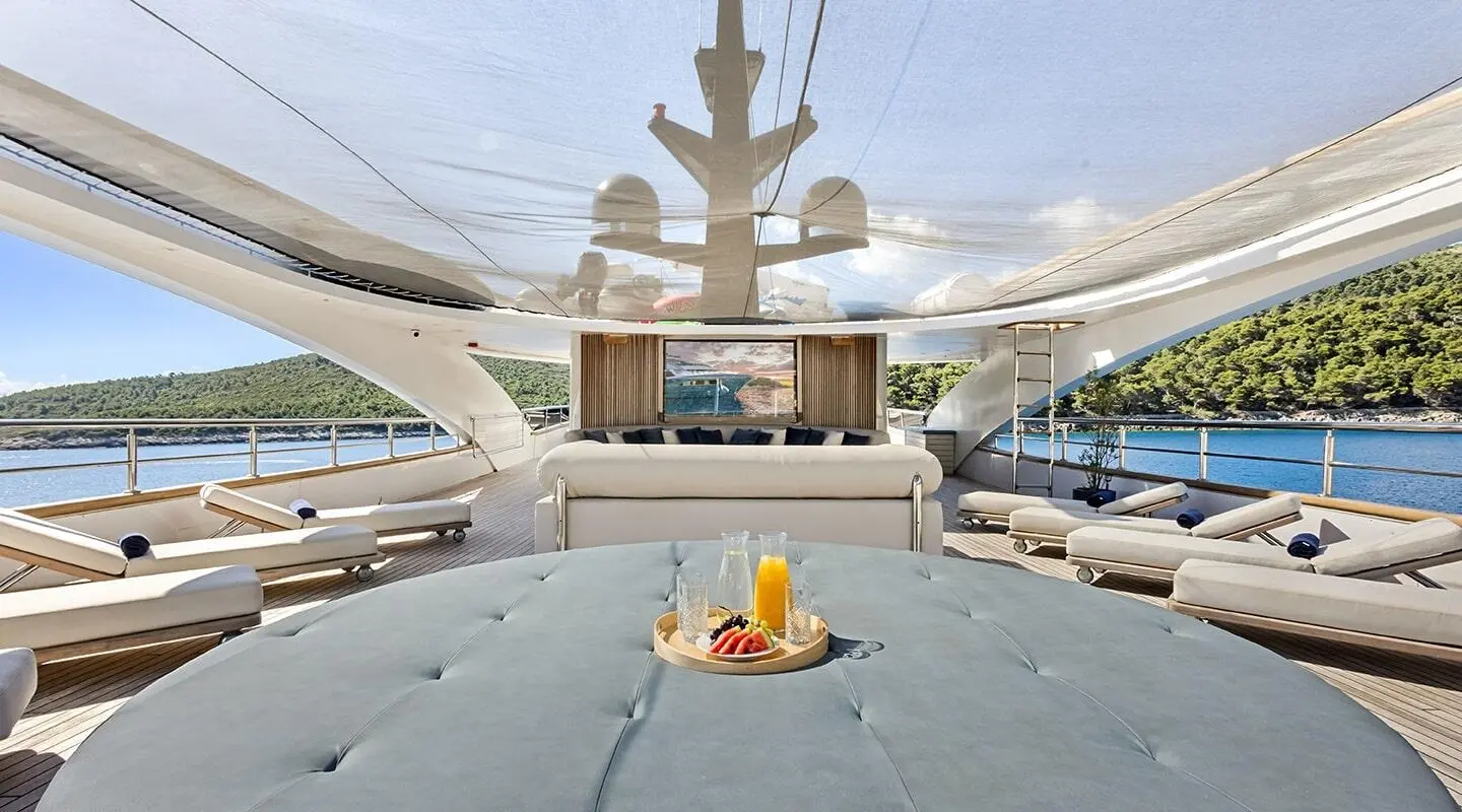 View from the bow forward deck of Bella yacht, sun loungers and seating seen