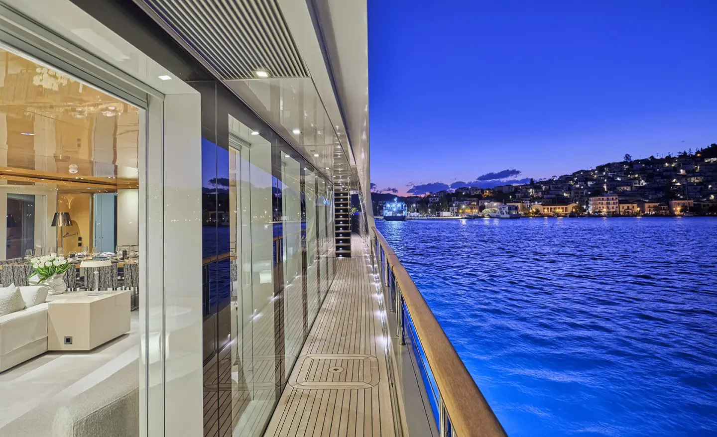 Side deck view of La Pellegrina 1 yacht, railing and water beside