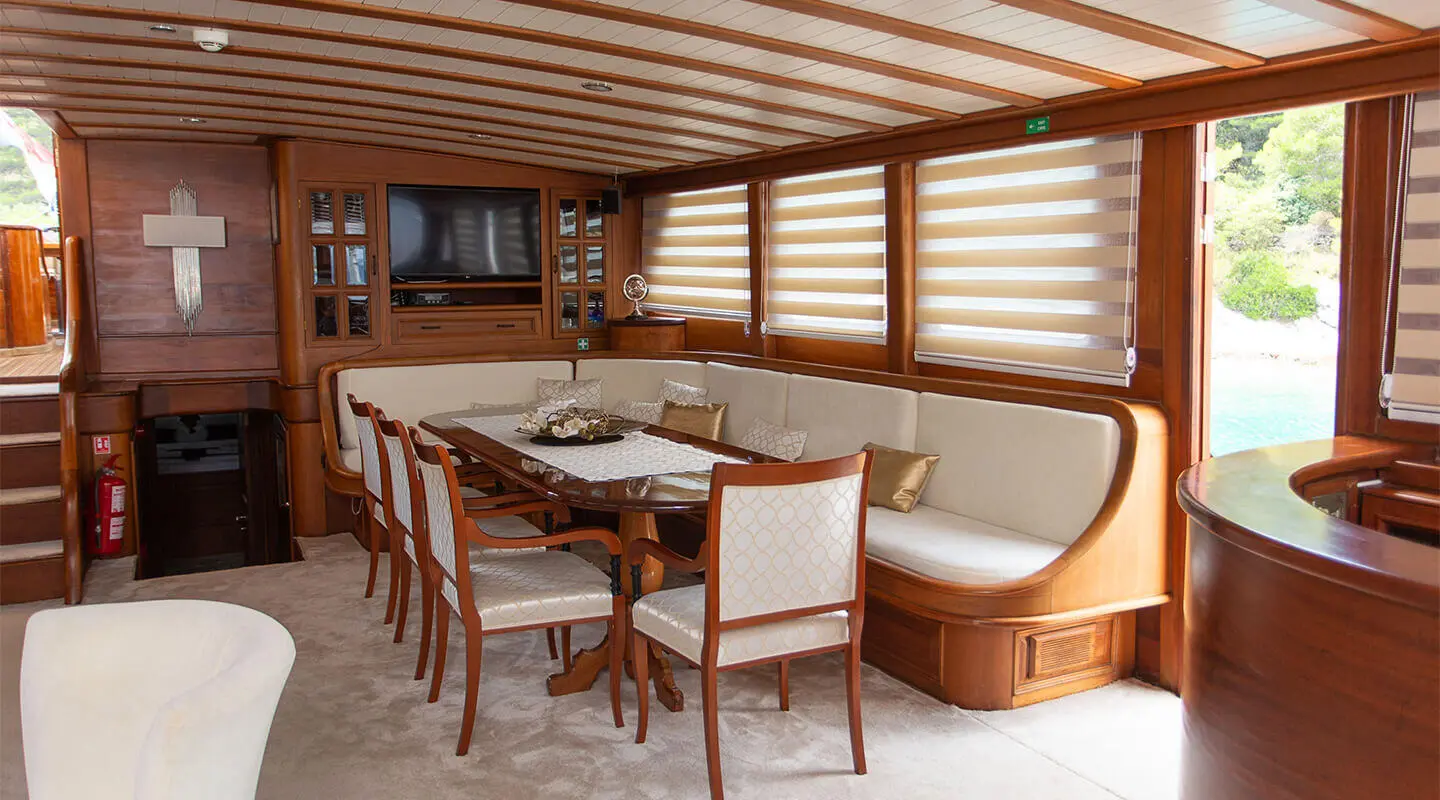 Dolce Vita yacht balcony dining area with wooden pergola and table setup