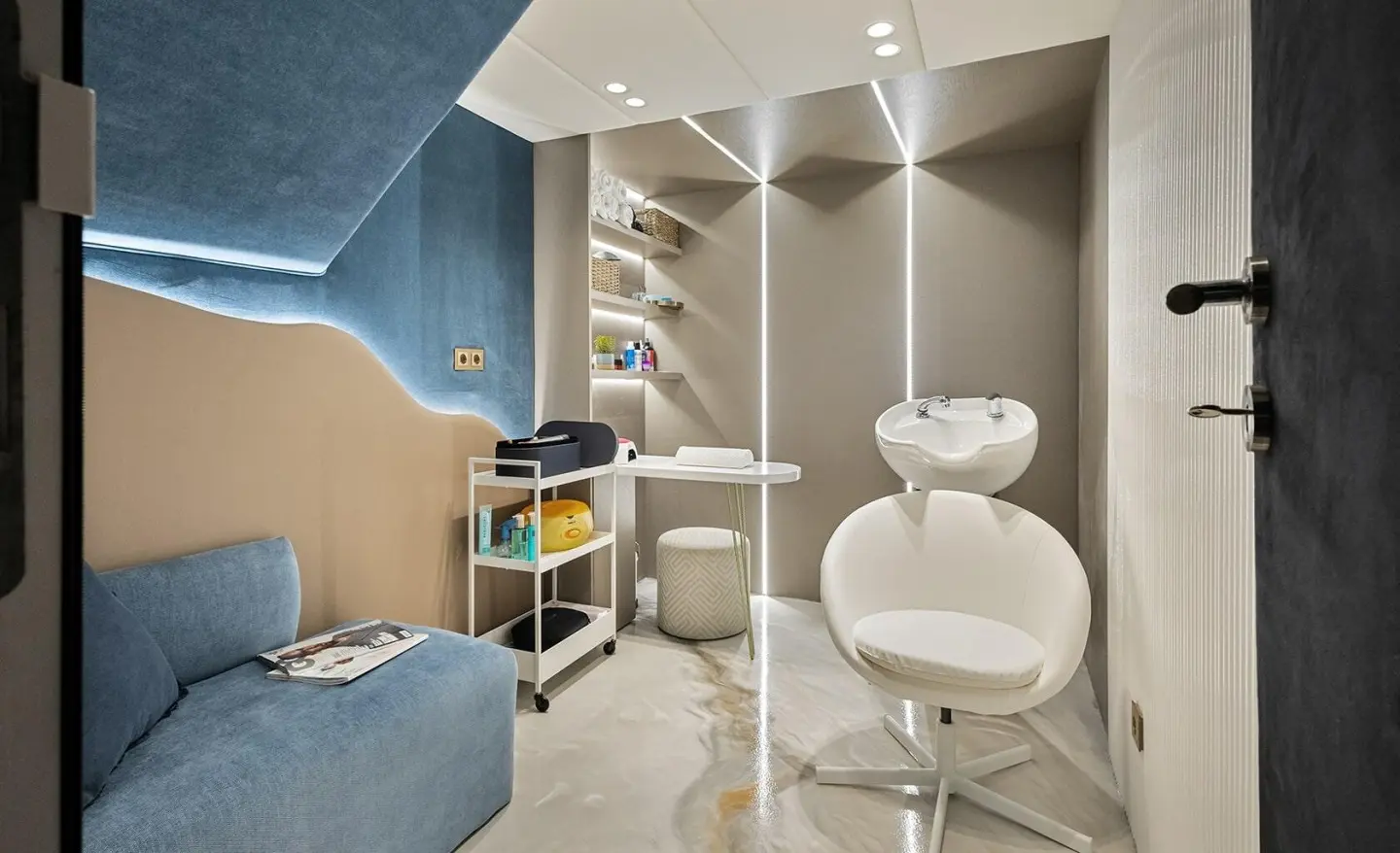 Bella yacht charter interior with white chair and beauty equipment