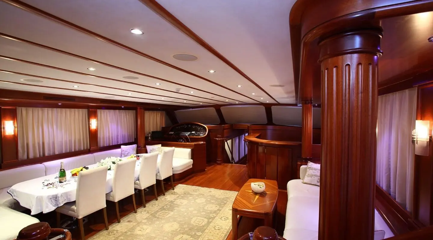 Luxurious yacht Kaya Guneri 5 interior: elegant lounge with white seating